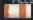 Orange and white medicine bottle icon.